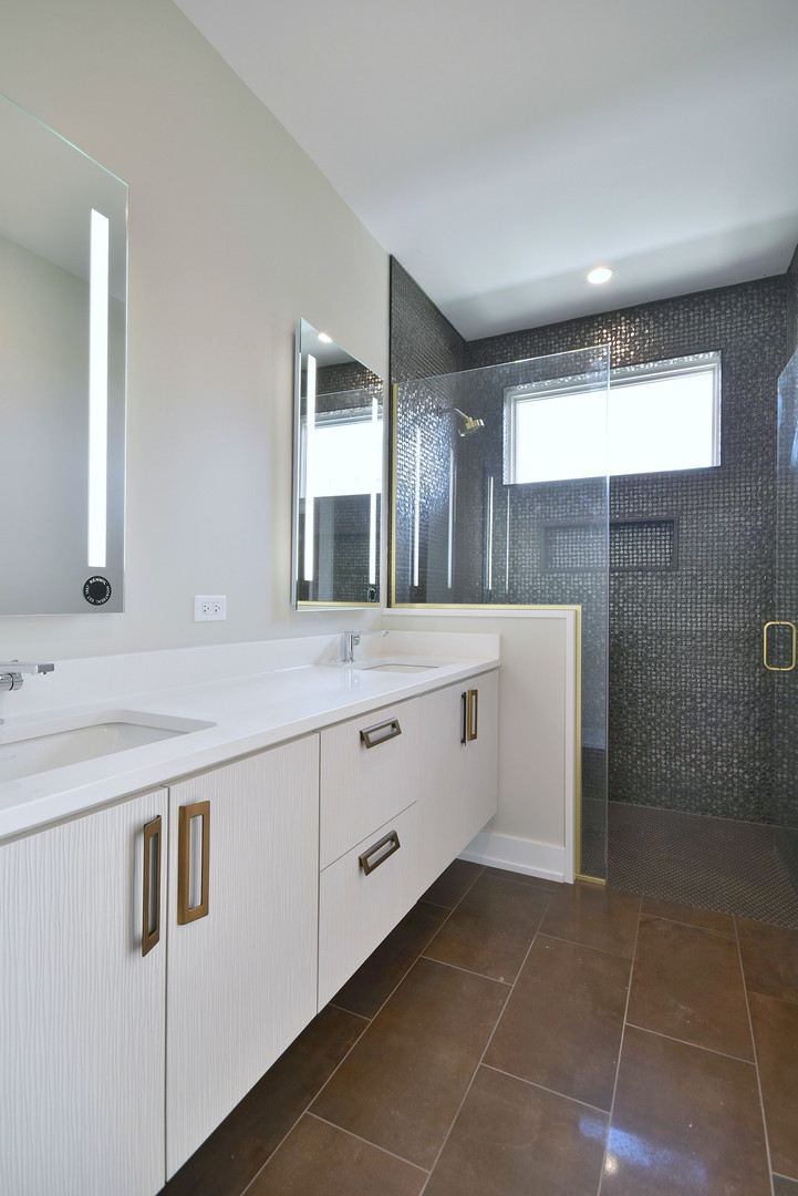 274 North Addison Avenue Elmhurst, IL 60126 - Photo 53 of 57 a bathroom with a double vanity sink a mirror and a