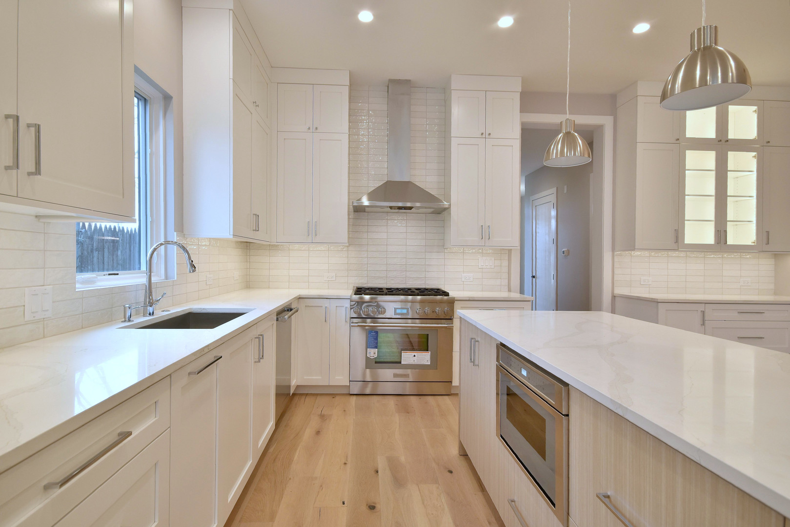 274 North Addison Avenue Elmhurst, IL 60126 - Photo 8 of 57 a kitchen with stainless steel appliances granite countertop a sink stove and cabinets