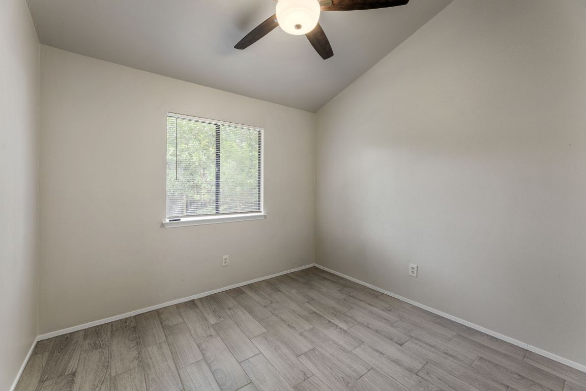 1808 Prairie Star Lane Round Rock, TX 78664 - Photo 15 of 32 an empty room with a window