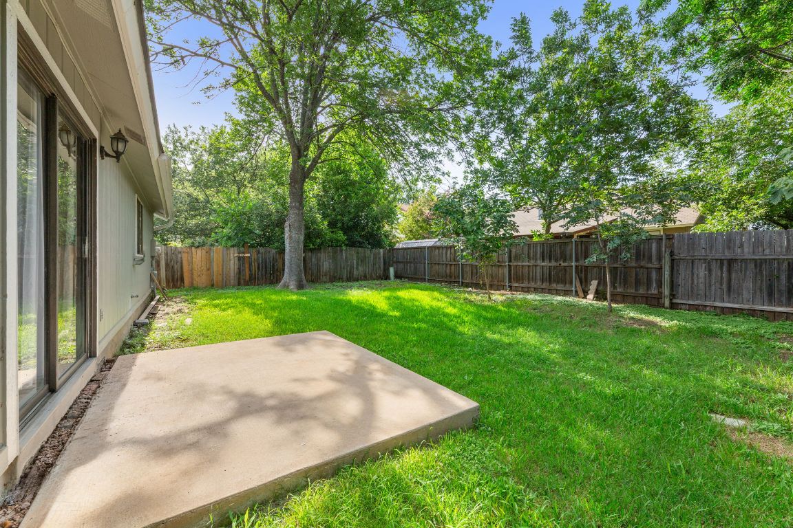1808 Prairie Star Lane Round Rock, TX 78664 - Photo 24 of 32 a view of a backyard with a garden