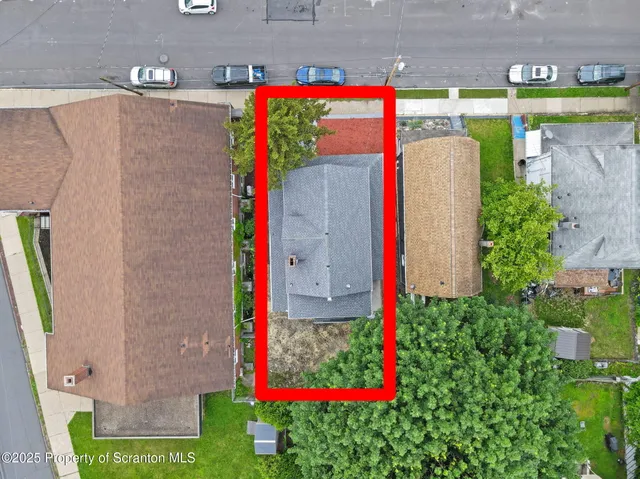 a street sign on the side of the building