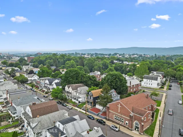 an aerial view of a city with lots of residential buildings
