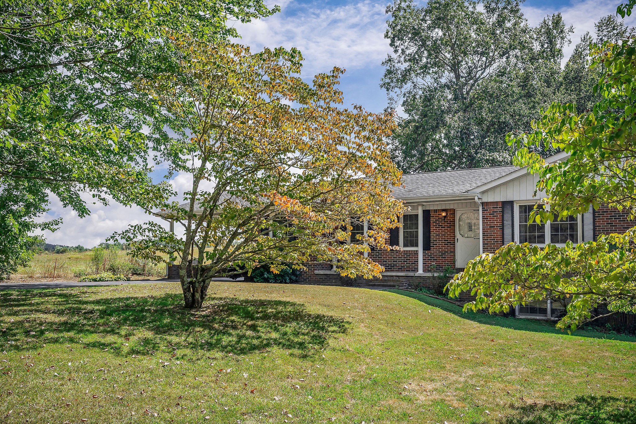 5036 Pendergrass Road Byrdstown, TN 38549 - Photo 29 of 38 a front view of a house with garden
