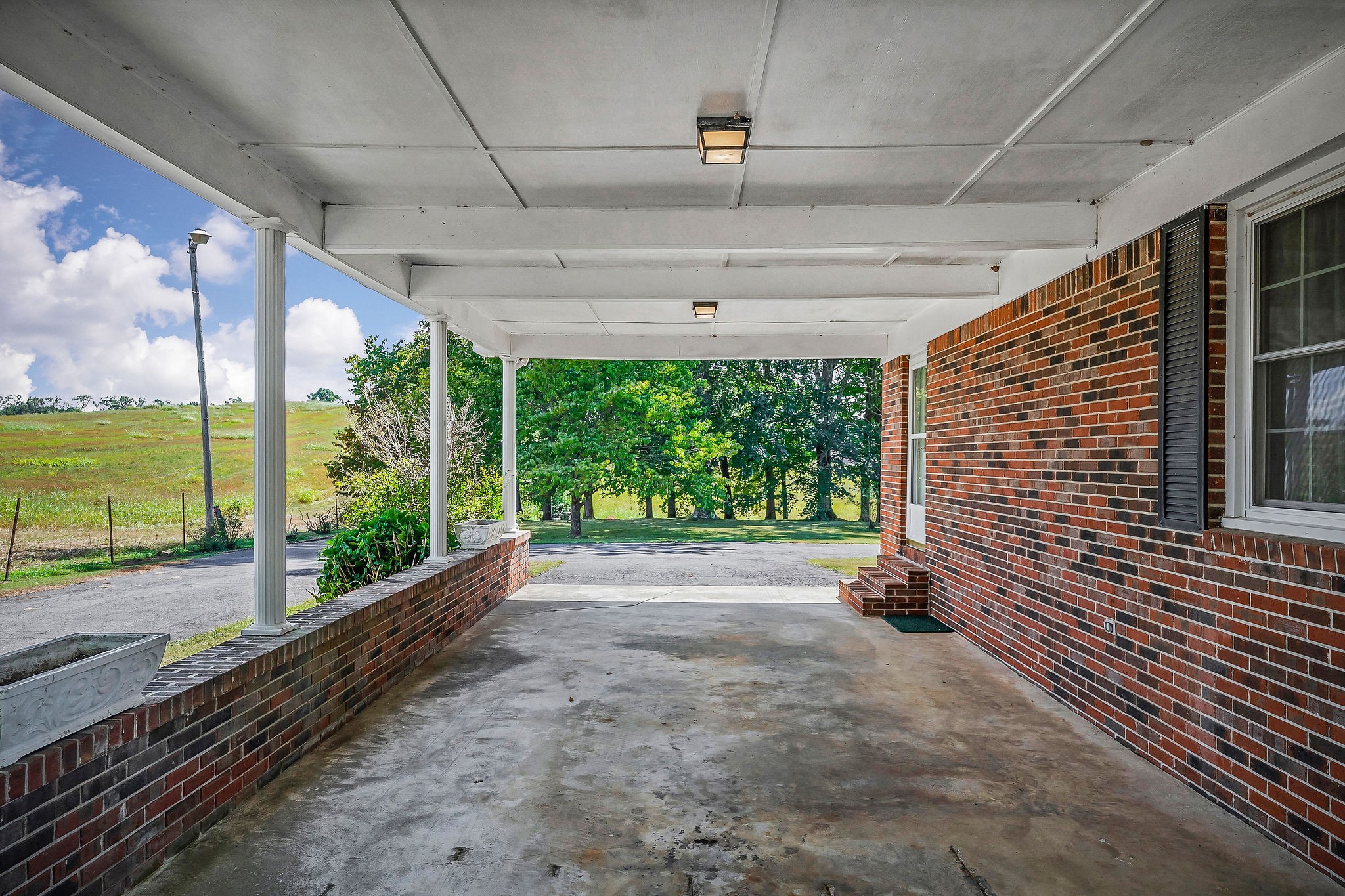 5036 Pendergrass Road Byrdstown, TN 38549 - Photo 32 of 38 a view of a porch and garden