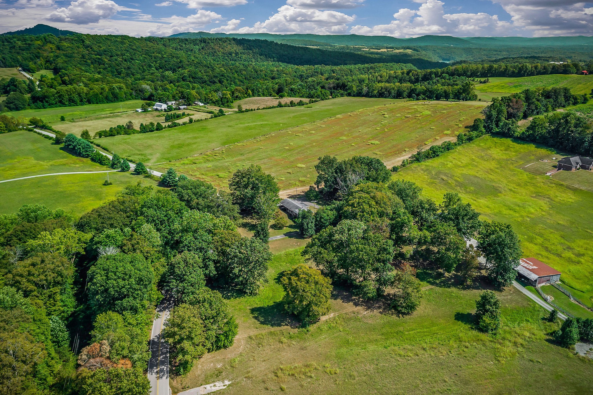 5036 Pendergrass Road Byrdstown, TN 38549 - Photo 5 of 38 a view of a golf course with a lake