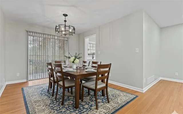 a kitchen with stainless steel appliances granite countertop a refrigerator stove and sink