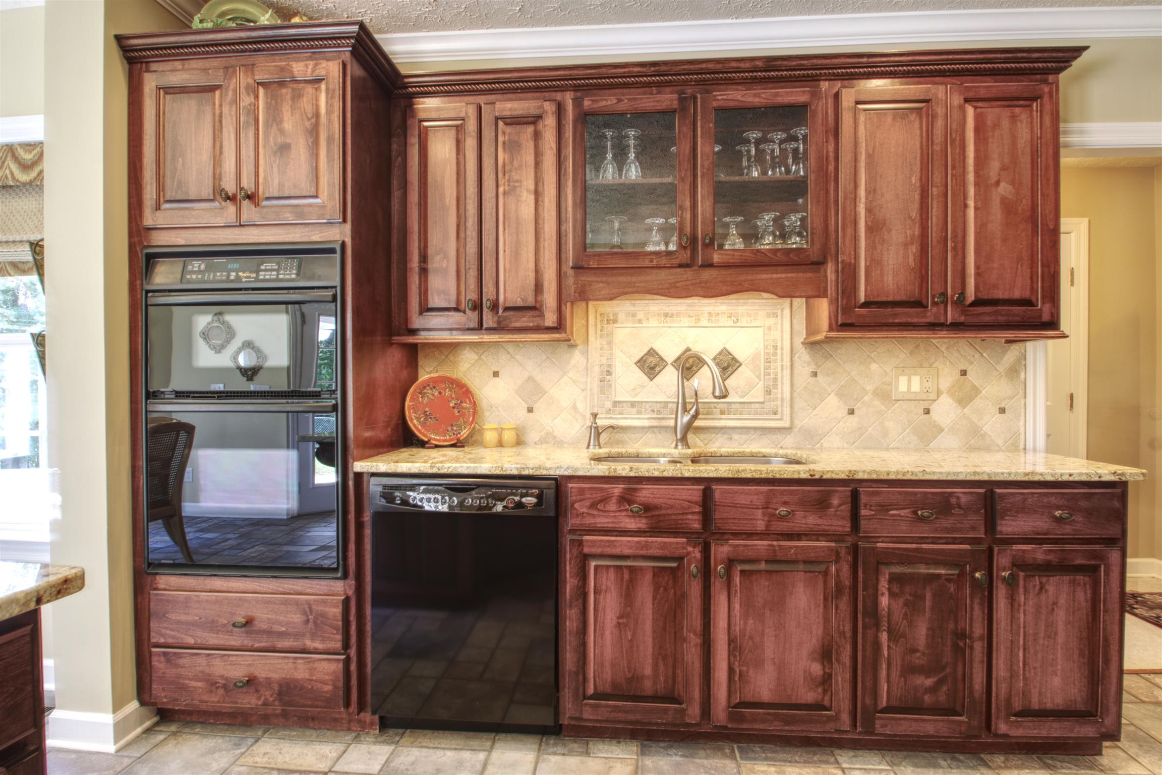 7177 Hall Road Greenbrier, TN 37073 - Photo 14 of 30 a kitchen with granite countertop cabinets and wooden floor