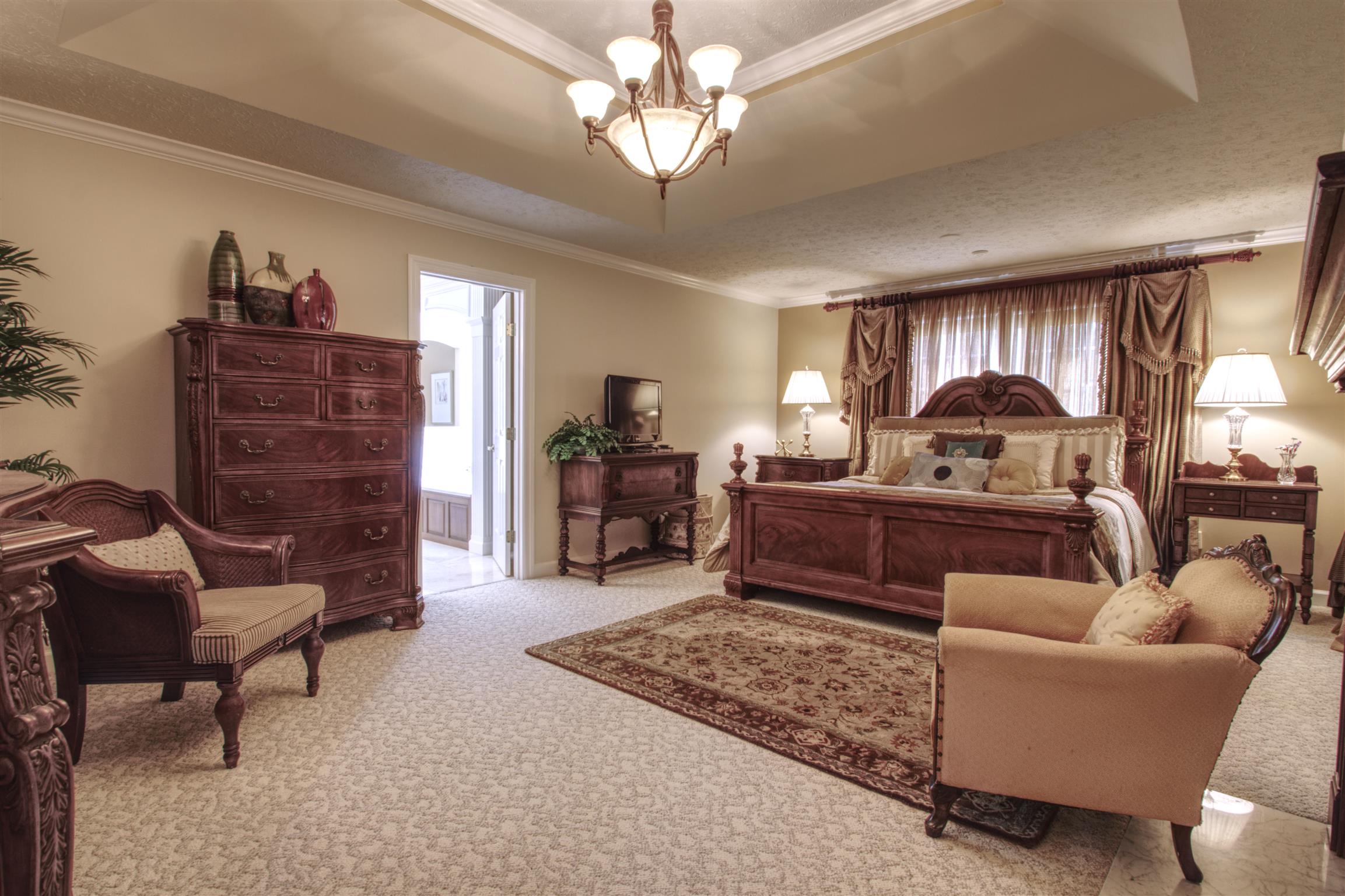 7177 Hall Road Greenbrier, TN 37073 - Photo 19 of 30 a living room with furniture a couch and a chandelier