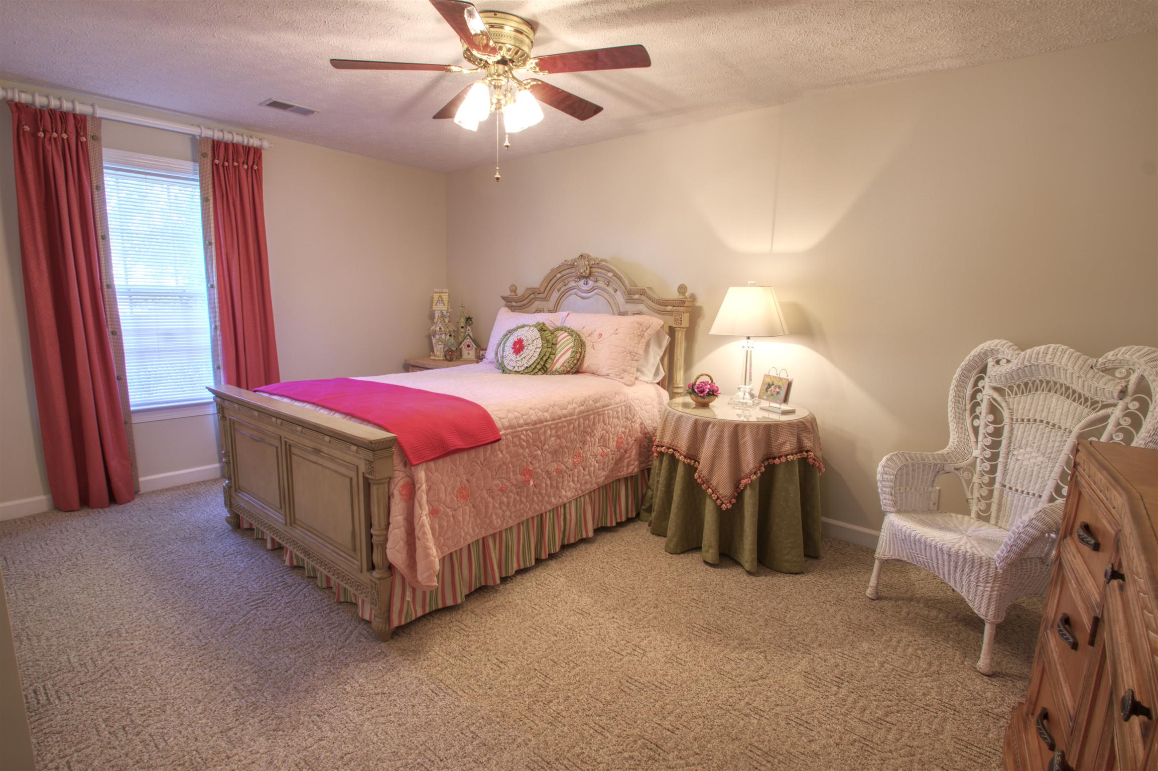 7177 Hall Road Greenbrier, TN 37073 - Photo 24 of 30 a bedroom with a bed and a chandelier