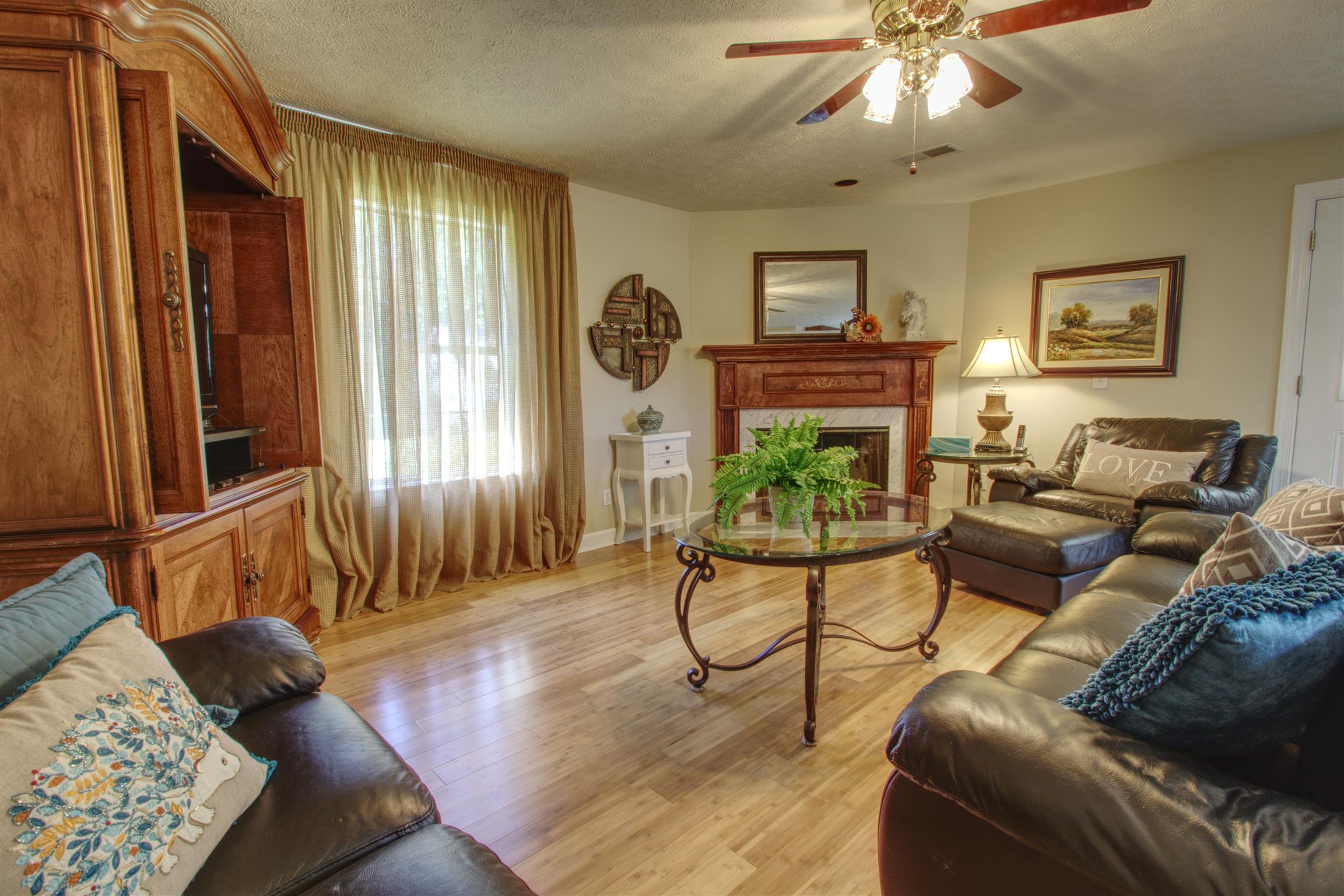 7177 Hall Road Greenbrier, TN 37073 - Photo 25 of 30 a living room with furniture and a window