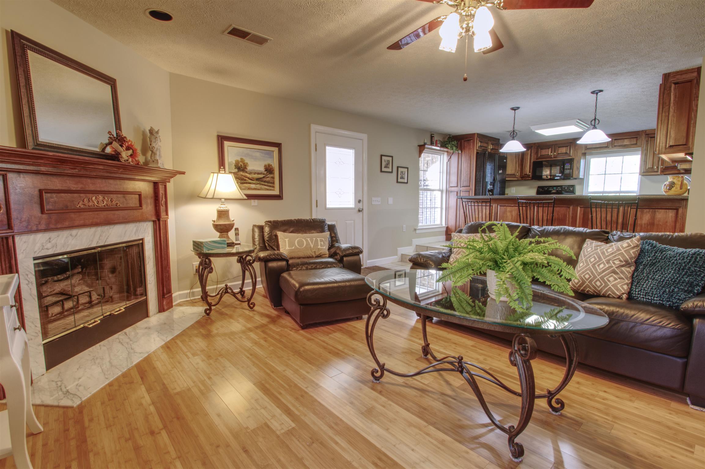 7177 Hall Road Greenbrier, TN 37073 - Photo 26 of 30 a living room with furniture and a fireplace