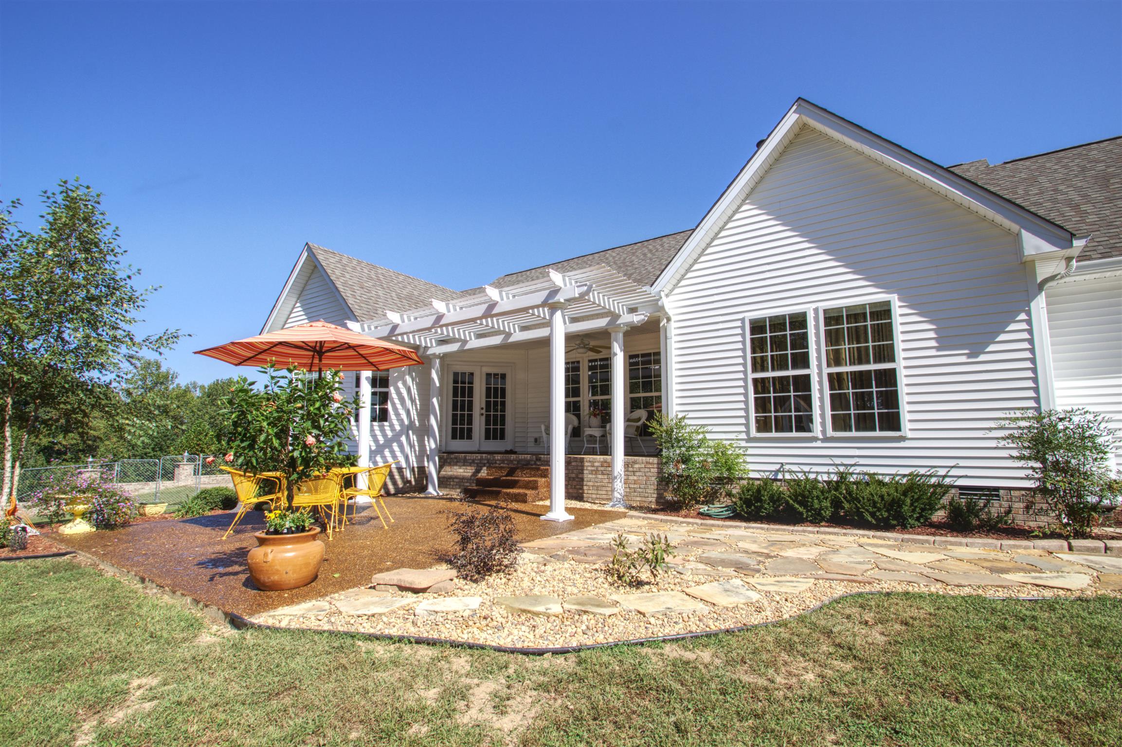 7177 Hall Road Greenbrier, TN 37073 - Photo 4 of 30 a view of a house with backyard porch and sitting area