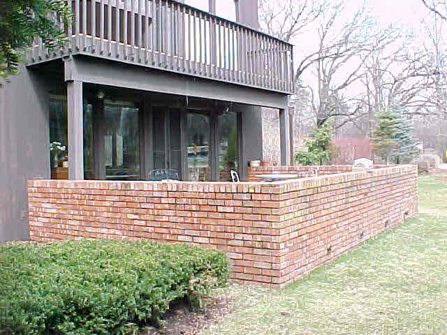 3303 Brookview Road Rockford, IL 61107 - Photo 5 of 6 a view of brick house with large windows