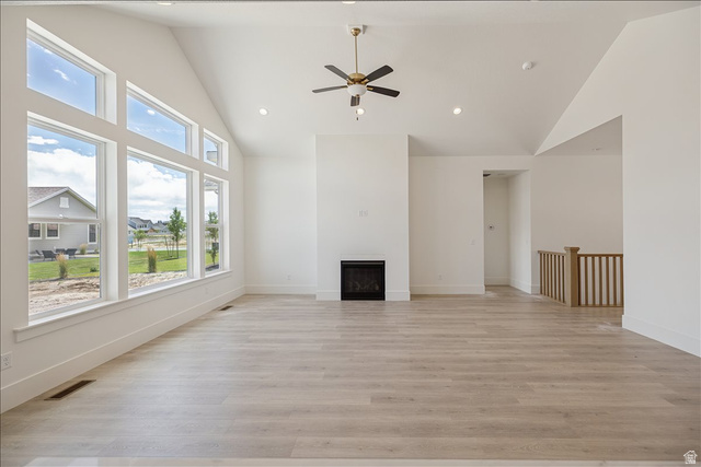 952 Mathilda Drive, Unit 156 Saratoga Springs, UT 84045 - Photo 8 of 25 Spacious room featuring a vaulted ceiling with recessed lighting and a ceiling fan