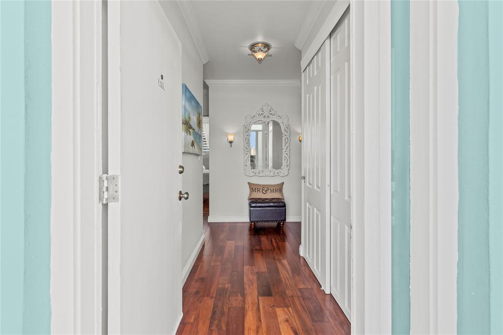1900 South Ocean Drive, Unit 503 Fort Lauderdale, FL 33316 - Photo 11 of 33 a view of a hallway with wooden floor and a bathroom