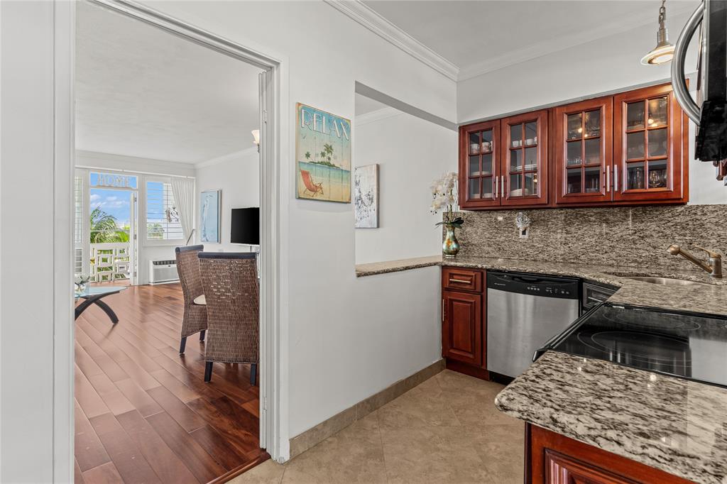 1900 South Ocean Drive, Unit 503 Fort Lauderdale, FL 33316 - Photo 15 of 33 a kitchen with a stove a refrigerator and a sink