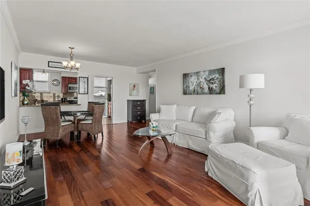 a living room with furniture fireplace and a flat screen tv
