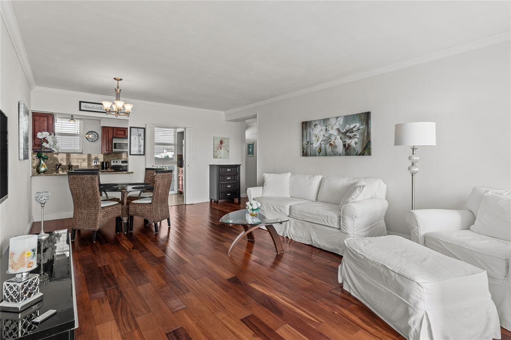 1900 South Ocean Drive, Unit 503 Fort Lauderdale, FL 33316 - Photo 17 of 33 a living room with furniture and a wooden floor