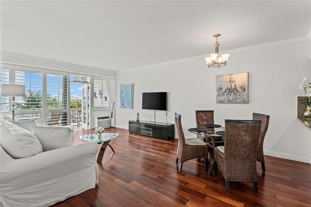 1900 South Ocean Drive, Unit 503 Fort Lauderdale, FL 33316 - Photo 18 of 33 a living room with furniture fireplace and a flat screen tv