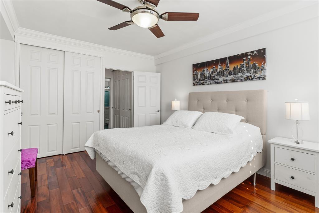 1900 South Ocean Drive, Unit 503 Fort Lauderdale, FL 33316 - Photo 22 of 33 a bedroom with a bed and wooden floor