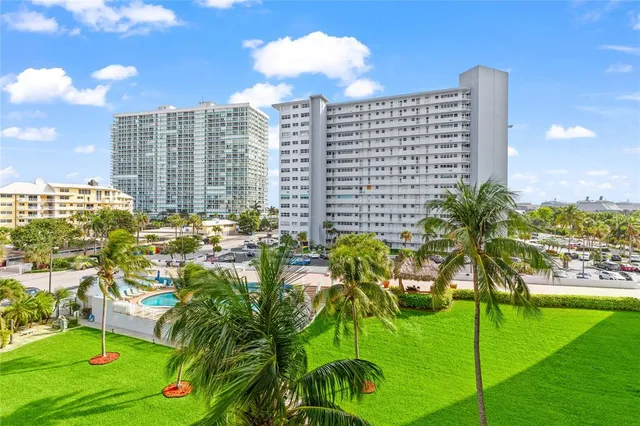 a view of city with tall buildings