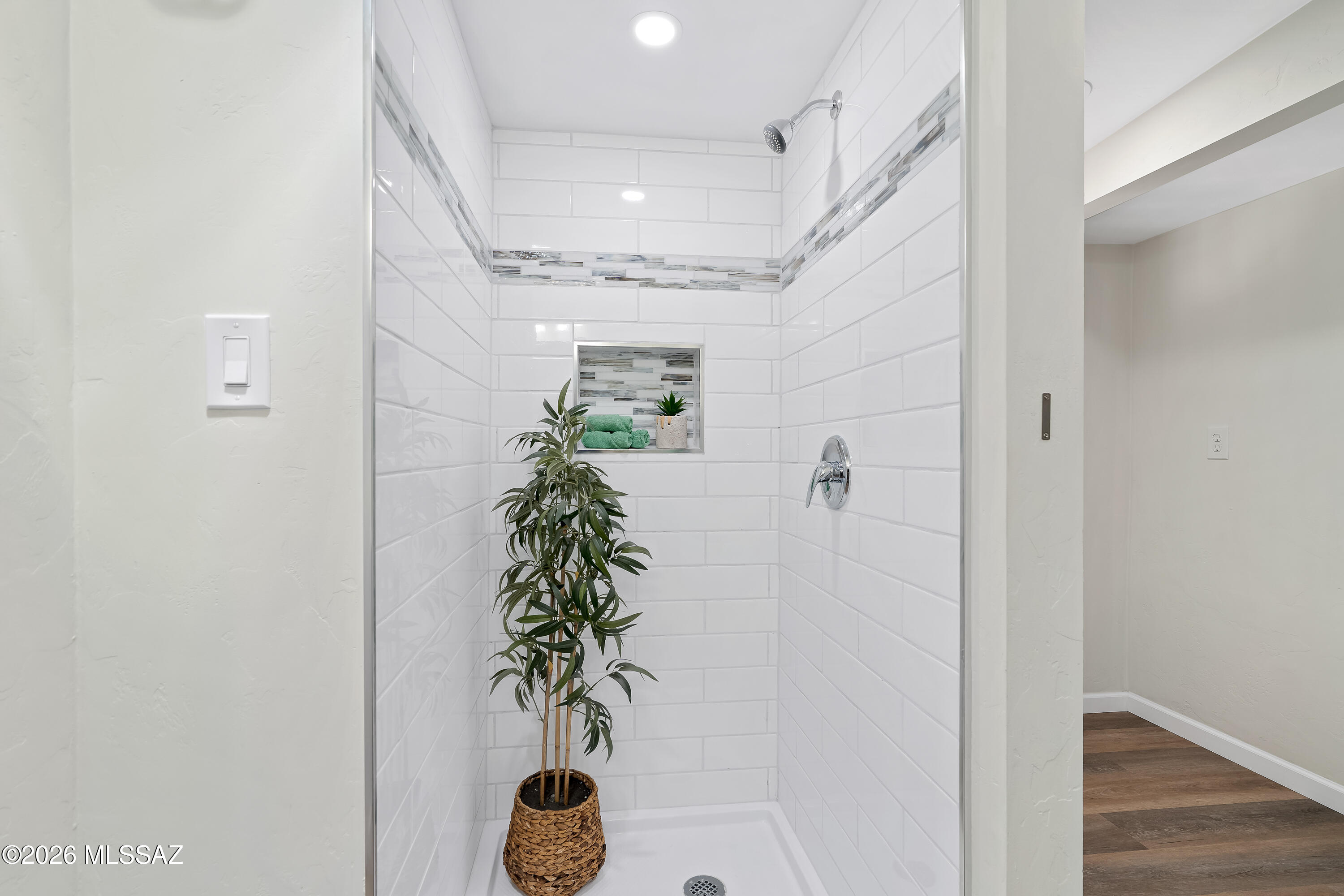 3150 East Presidio Road Tucson, AZ 85716 - Photo 25 of 33 Brand-new tiled shower with fresh, modern finishes.