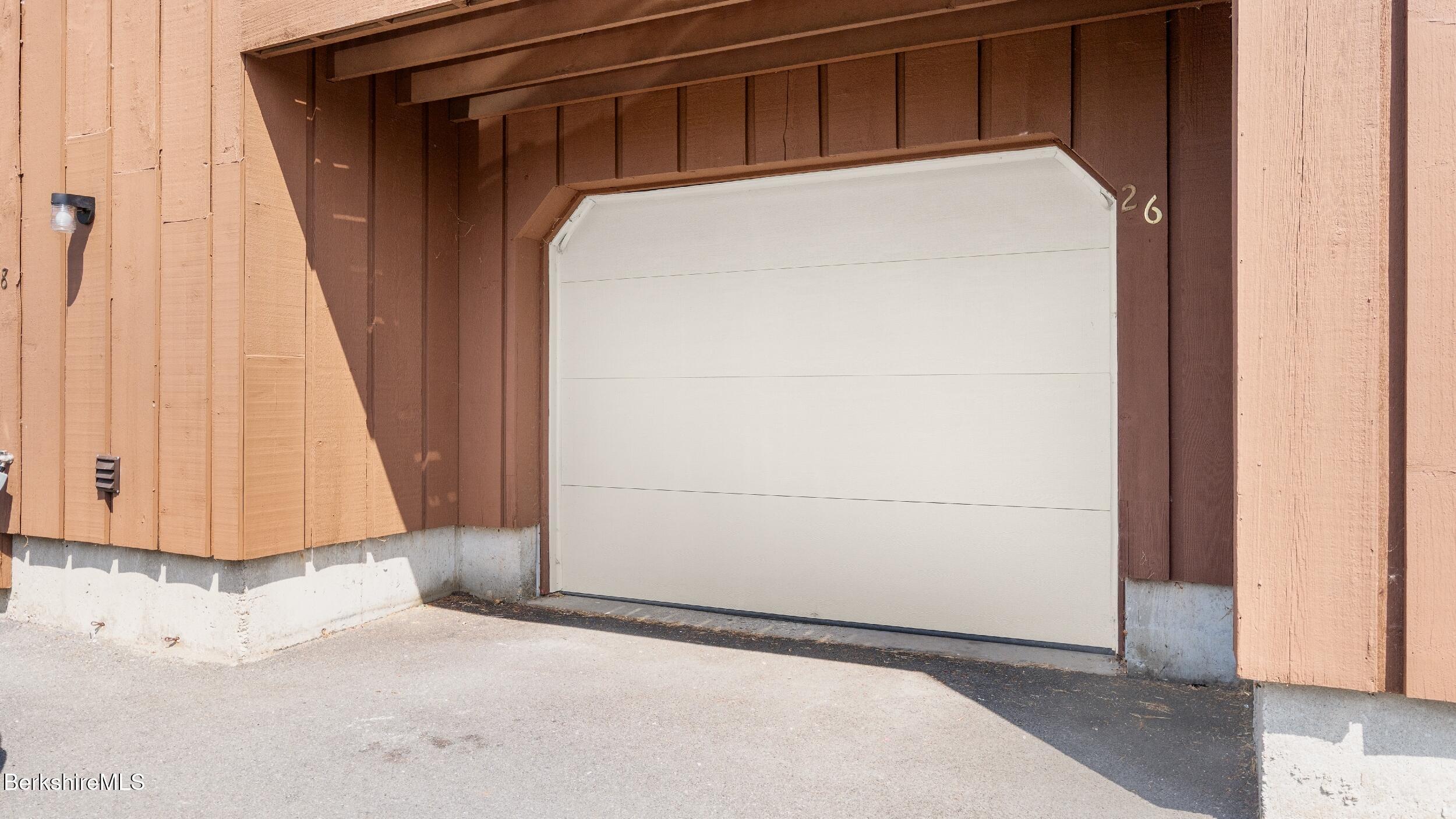 26 Churchill Crest Pittsfield, MA 01201 - Photo 15 of 16 a view of a house with a white door and a window