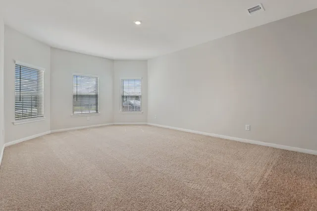 an empty room with windows