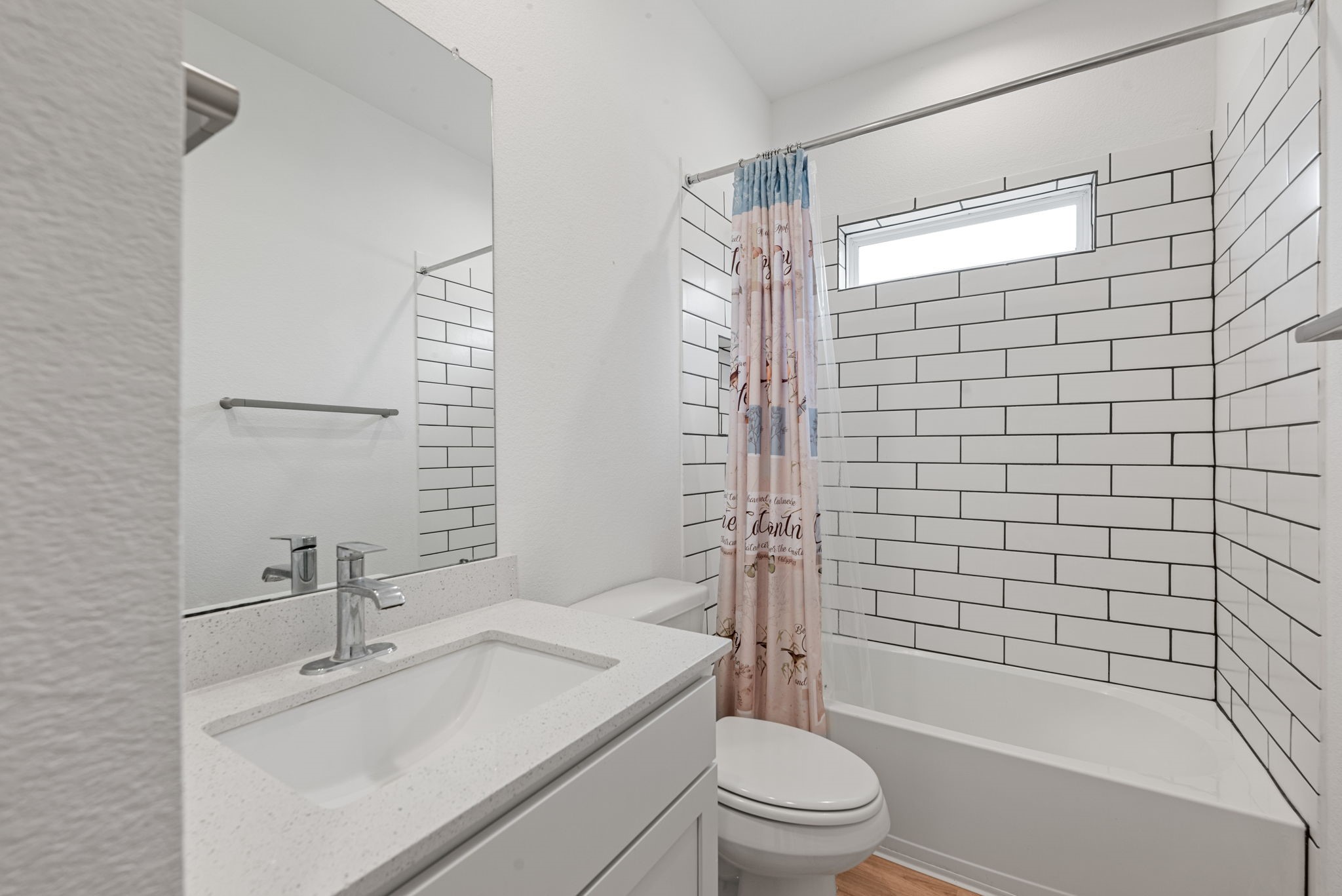 14019 Valley Creek Conroe, TX 77384 - Photo 14 of 30 a bathroom with a sink toilet and shower