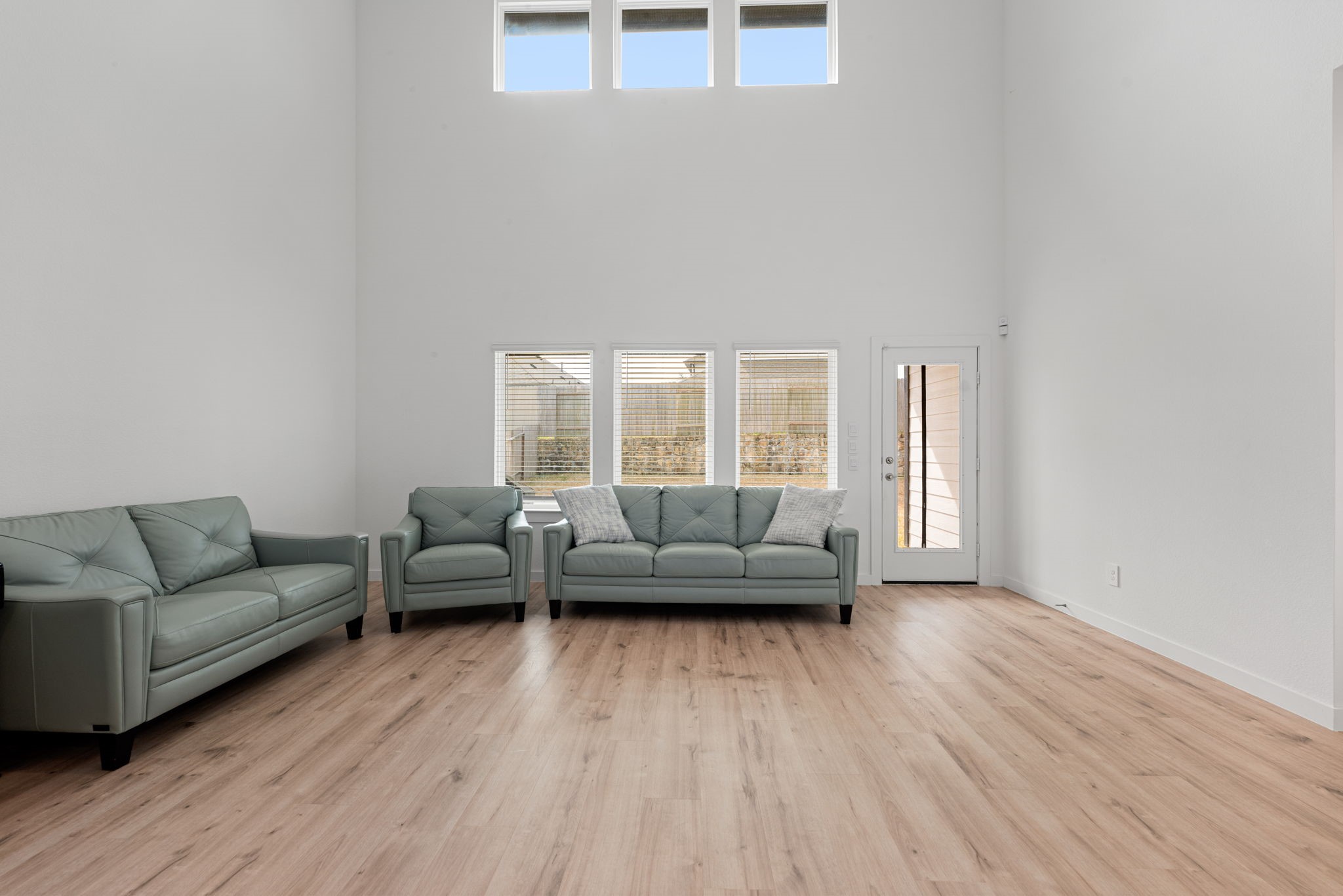 14019 Valley Creek Conroe, TX 77384 - Photo 8 of 30 a living room with furniture and a wooden floor