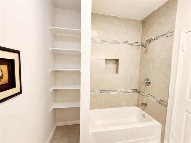 a bathroom with a bathtub