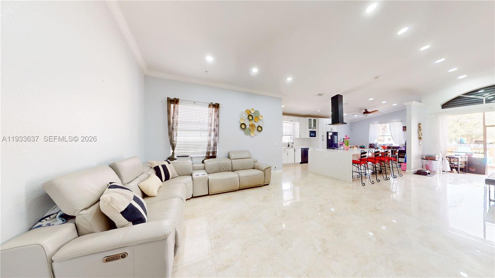 13877 Southwest 50th Street Miramar, FL 33027 - Photo 11 of 54 a living room with furniture and a couch