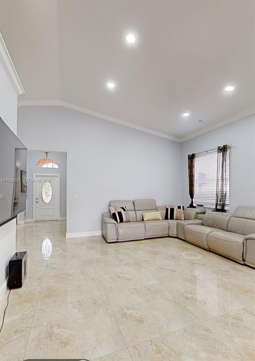 13877 Southwest 50th Street Miramar, FL 33027 - Photo 15 of 25 a living room with furniture