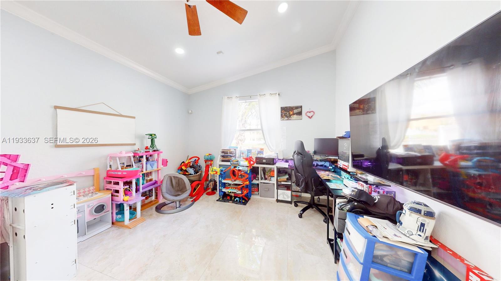 13877 Southwest 50th Street Miramar, FL 33027 - Photo 20 of 54 a view of a play room with toys and toys