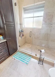 a bathroom with a sink and a shower