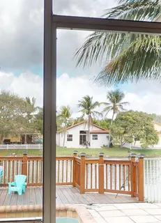 a view of a balcony with lake view