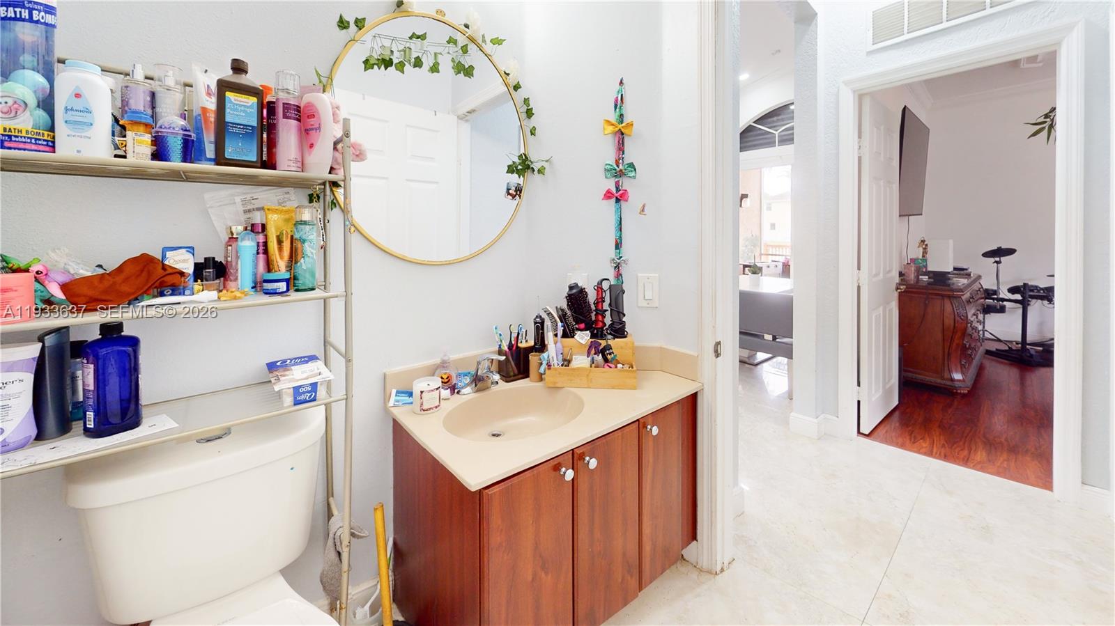 13877 Southwest 50th Street Miramar, FL 33027 - Photo 42 of 54 a utility room with a sink washer and dryer