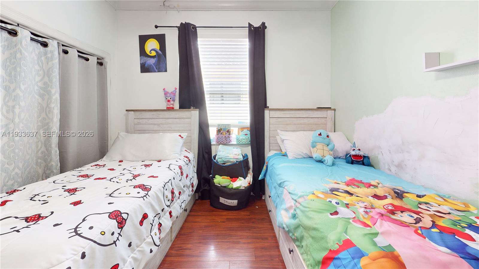 13877 Southwest 50th Street Miramar, FL 33027 - Photo 47 of 54 a bedroom with a bed and a dresser