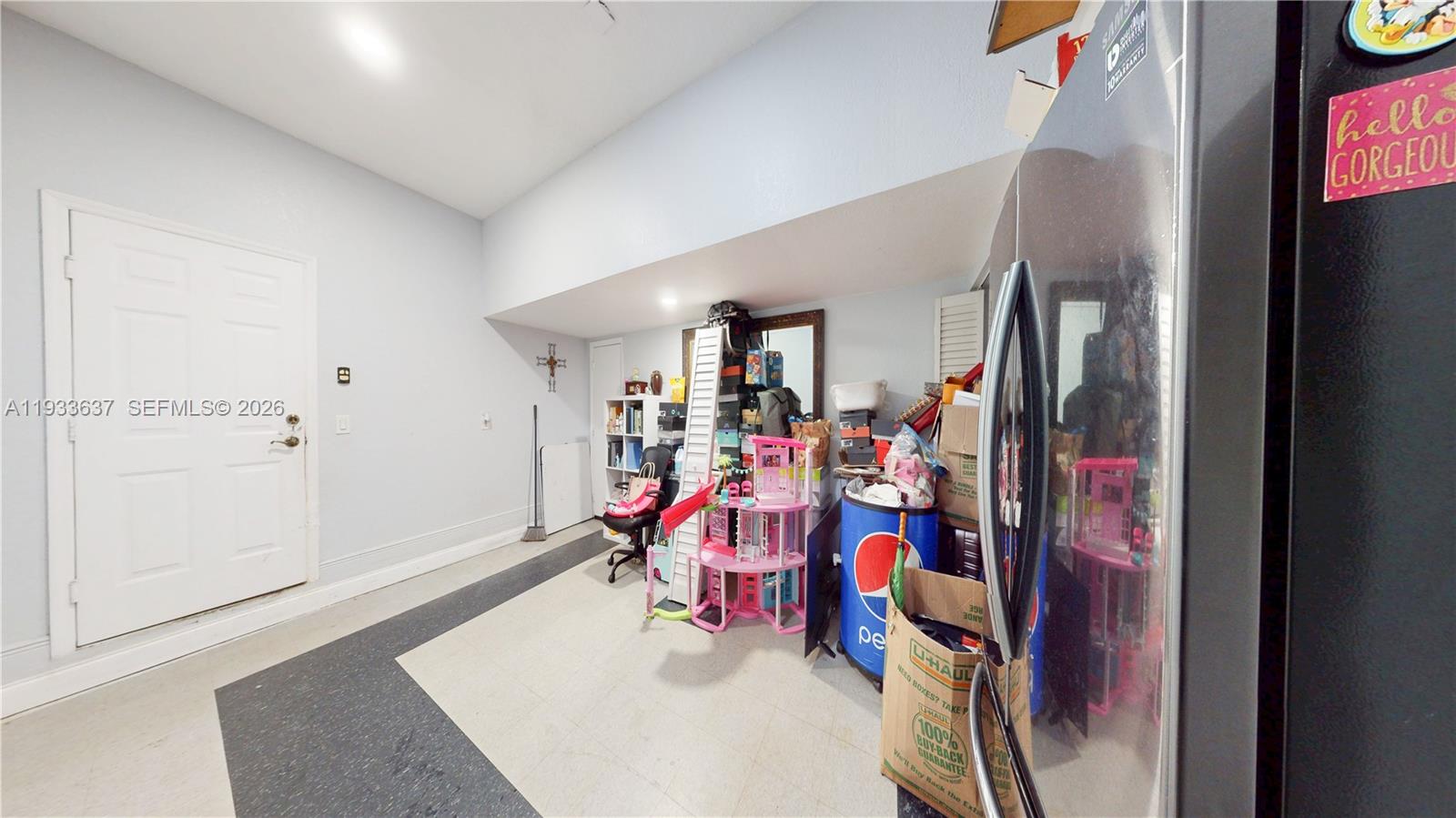 13877 Southwest 50th Street Miramar, FL 33027 - Photo 49 of 54 a view of a room with gym equipment