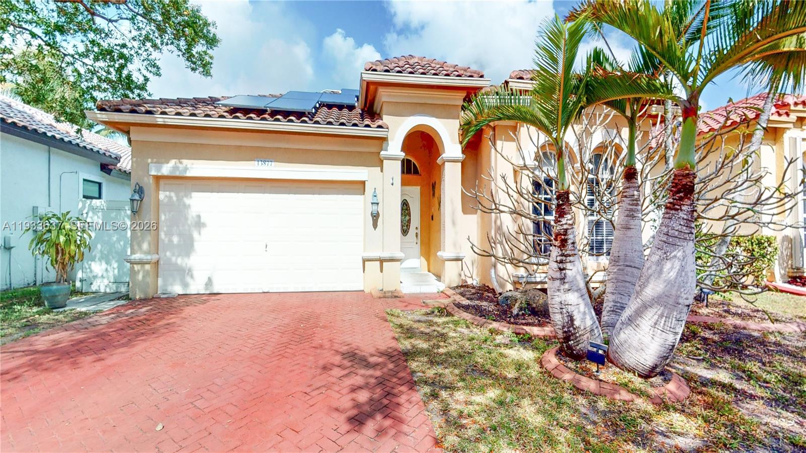 13877 Southwest 50th Street Miramar, FL 33027 - Photo 54 of 54 a view of a house with a yard