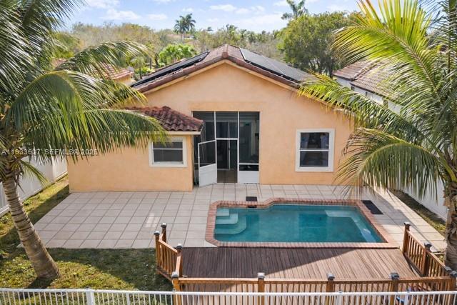 13877 Southwest 50th Street Miramar, FL 33027 - Photo 8 of 54 a view of backyard of a house