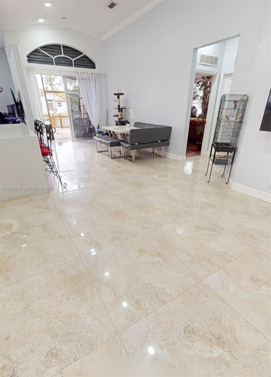13877 Southwest 50th Street Miramar, FL 33027 - Photo 9 of 25 a view of dining room with furniture and a window