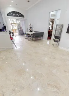 a kitchen with stainless steel appliances a sink and cabinets