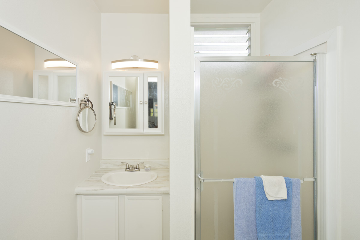 92-1663 Keaka Parkway Ocean View, HI 96704 - Photo 21 of 30 a bathroom with a shower