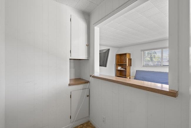 2056 Trinity Street San Mateo, CA 94403 - Photo 26 of 42 a view of a kitchen with a sink and a window
