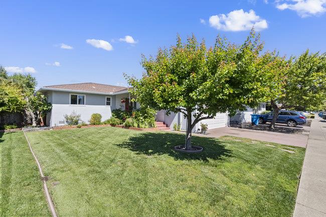 2056 Trinity Street San Mateo, CA 94403 - Photo 32 of 42 a front view of a house with garden