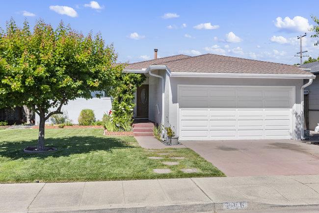 2056 Trinity Street San Mateo, CA 94403 - Photo 42 of 42 a view of a house with a yard and garage