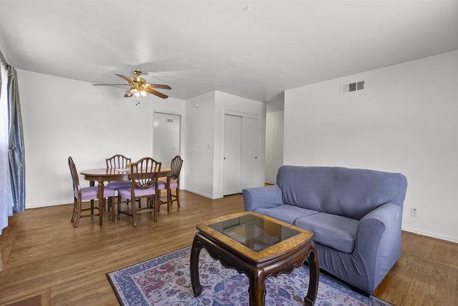 2056 Trinity Street San Mateo, CA 94403 - Photo 6 of 42 a living room with furniture a rug and a table