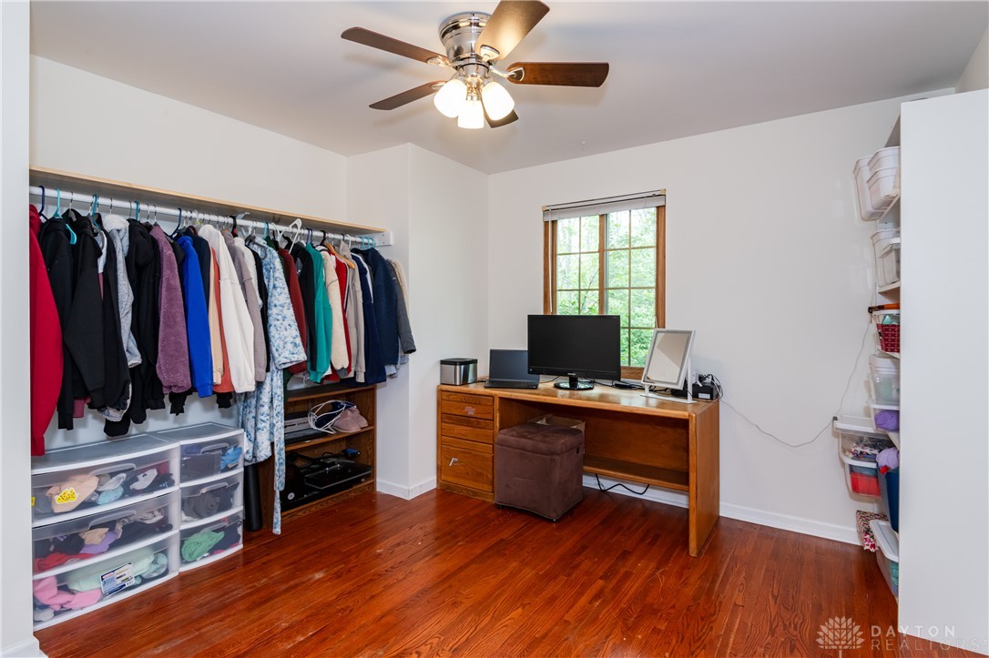 728 Chipplegate Drive Centerville, OH 45459 - Photo 19 of 30 This spacious bedroom offers ample storage, bright natural light, and classic hardwood flooring.