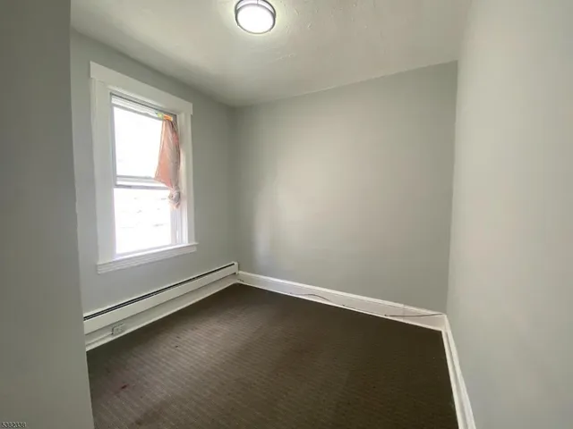 an empty room with a door